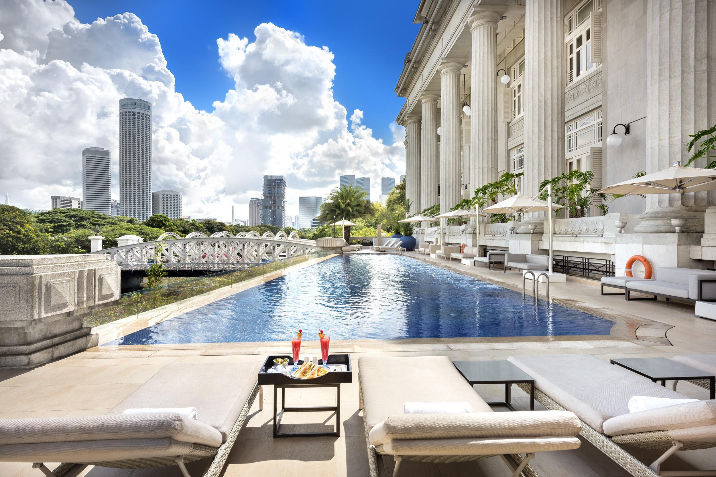 The Fullerton Hotel Szingapúr Kültér fotó The pool at the Raffles Hotel Le Royal