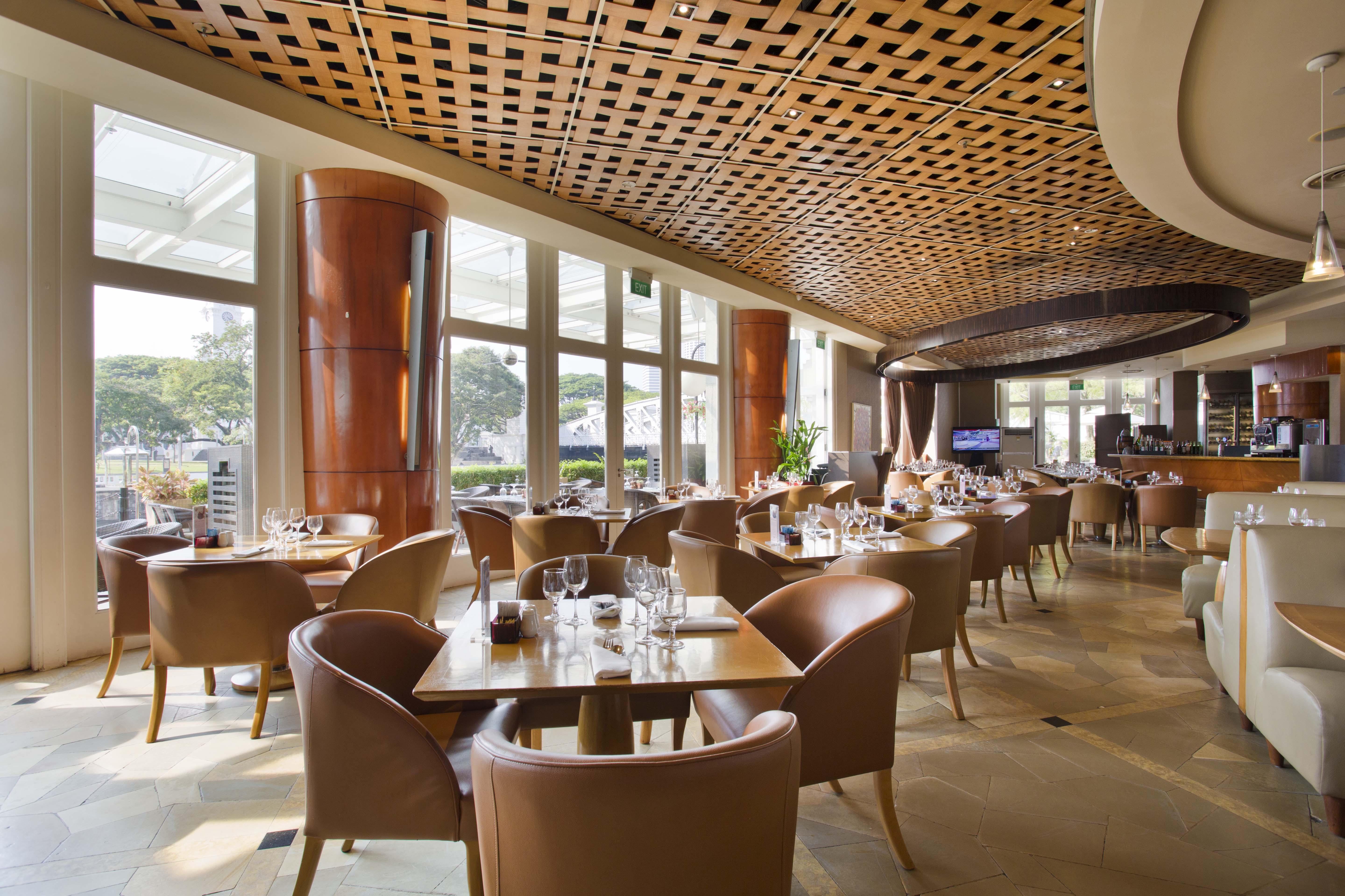 The Fullerton Hotel Szingapúr Kültér fotó The interior of the restaurant
