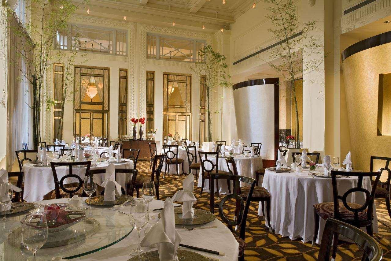 The Fullerton Hotel Szingapúr Kültér fotó The interior of the restaurant